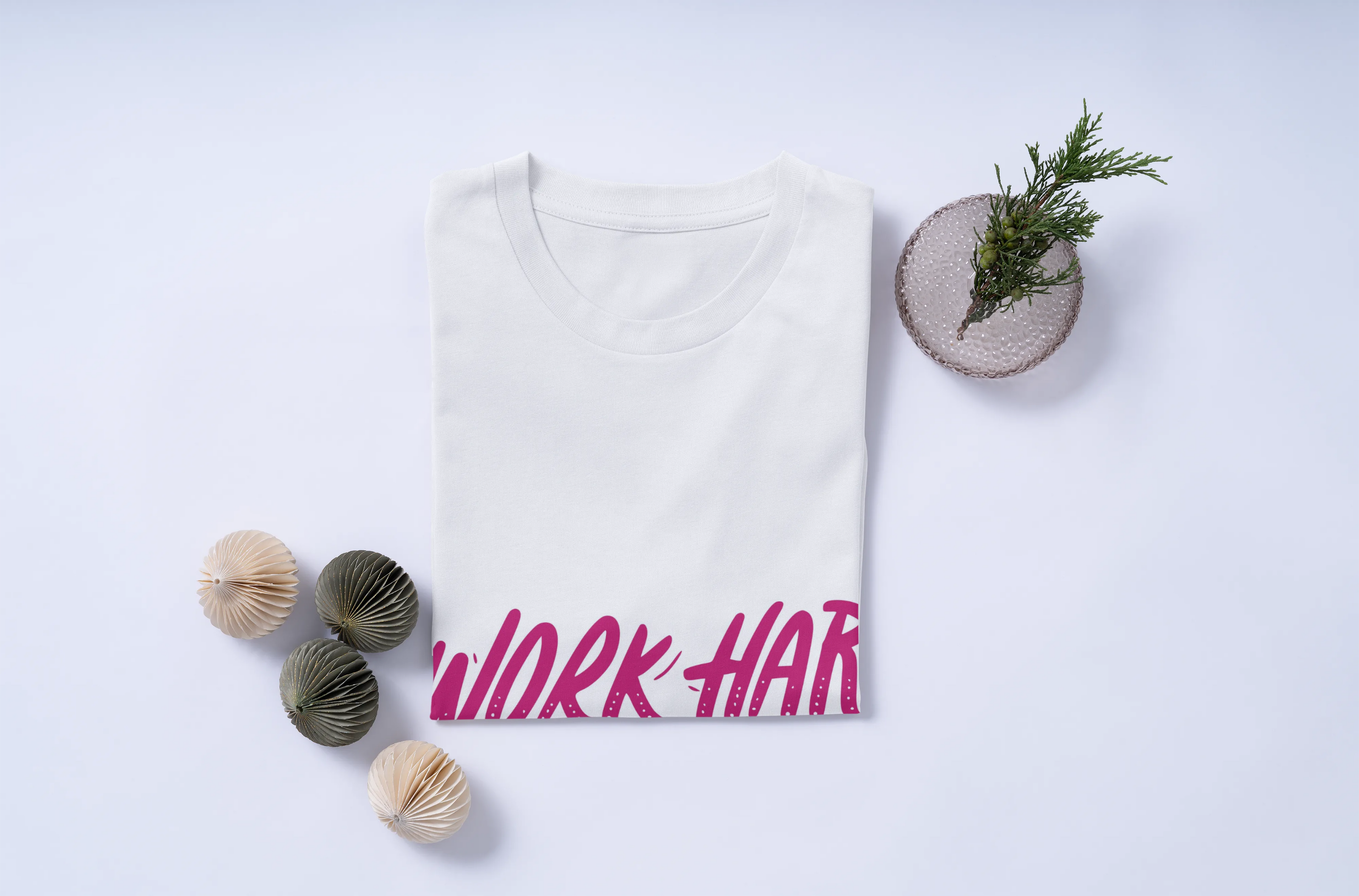 White t-shirt with 'WORK HARD STAY HUMBLE' text on a light gray background