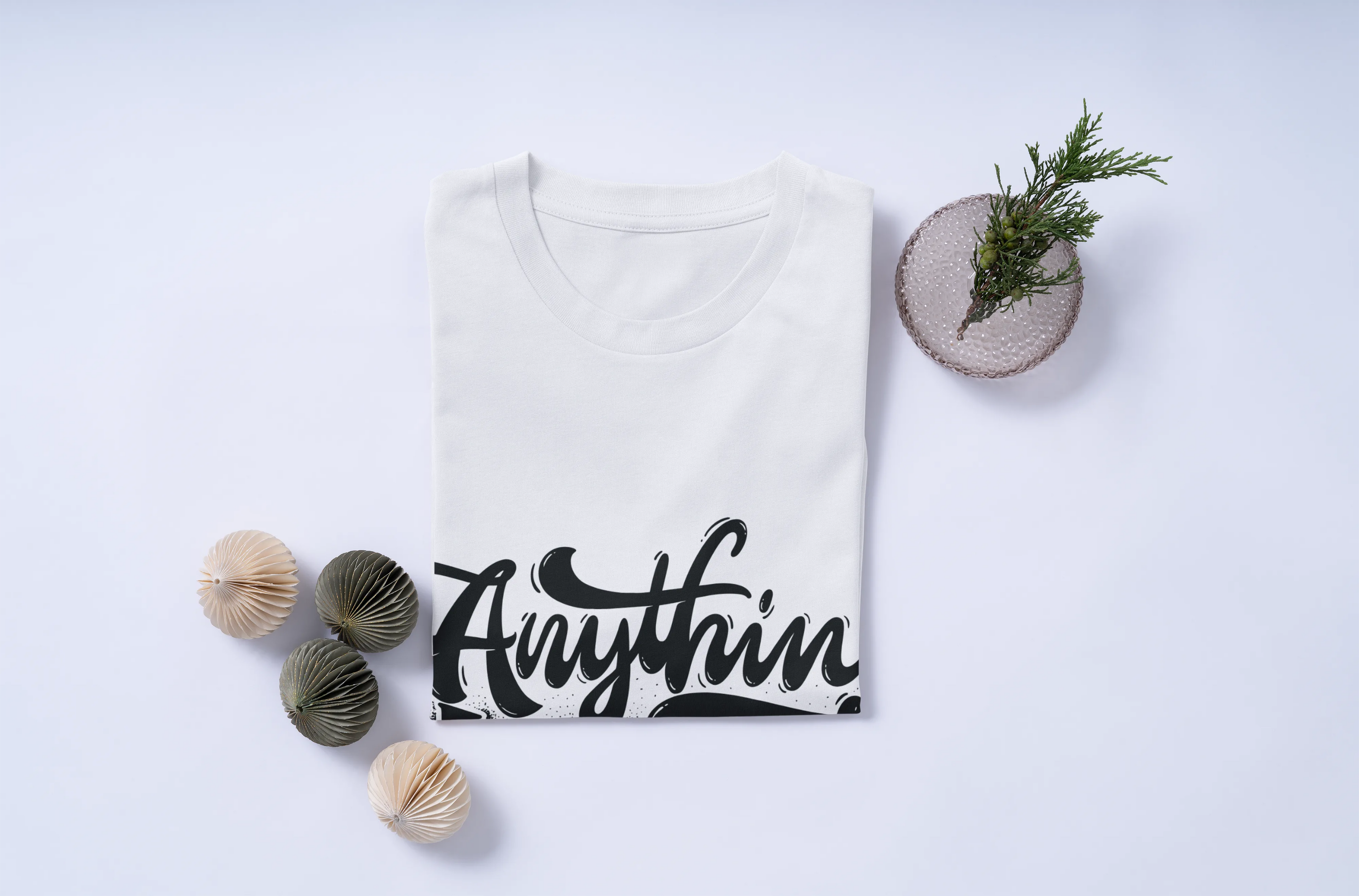 White t-shirt with 'Anything work having takes time' text on a light gray background